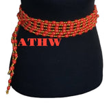 African Traditional Home and Wear Imoto traditional red and gold waist beads worn on a black mannequin