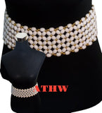 African Traditional Home and Wear Imoto waist beads featuring white oval beads with gold accents on a black mannequin